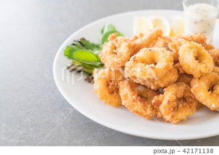 fried squid (calamari rings) fried squid (calamari rings) 42171138