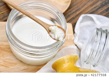 Kefir milk, Close up of hand holding kefir grains. Kefir milk, Close up of hand holding kefir grains. 42177508