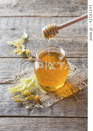 Glass jar of honey, Linden flowers  42181241