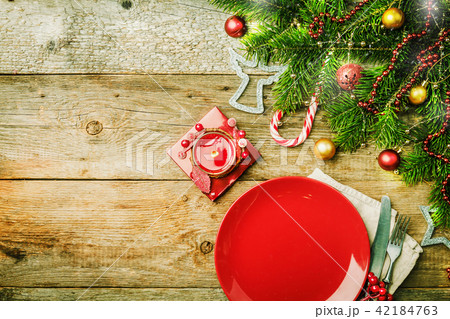Christmas table place setting Christmas table place setting 42184763