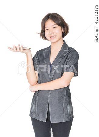 Women stand with using mobile phone 42192185