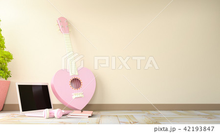 Ukulele sweet pink heart. Placed against the wall 42193847