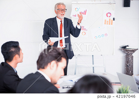 Businesspeople meeting and discussing Businesspeople meeting and discussing 42197046