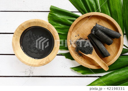Facial mask and scrub by activated charcoal powder Facial mask and scrub by activated charcoal powder 42198331