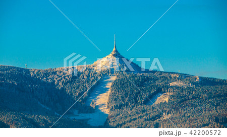 Morning sunrise at Jested Mountain and Jested Ski Resort. Winter time mood. Liberec, Czech Republic Morning sunrise at Jested Mountain and Jested Ski Resort. Winter time mood. Liberec, Czech Republic 42200572