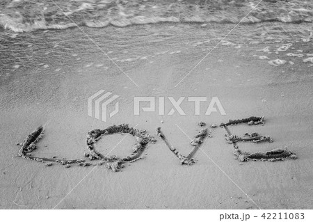 On the sand written word and his love washes wave 42211083