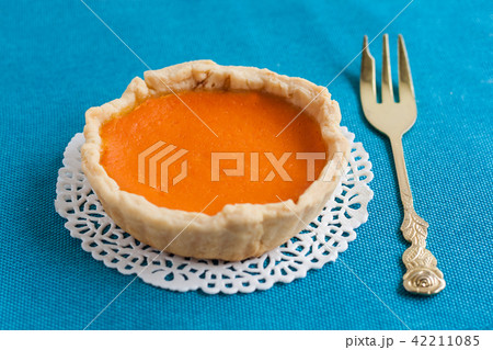 Bright pumpkin tart, flan, in the context of cream 42211085
