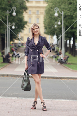 Beautiful girl walking around the street Beautiful girl walking around the street 42213857
