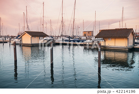 Sailing yachts and floating houses in marina Sailing yachts and floating houses in marina 42214196