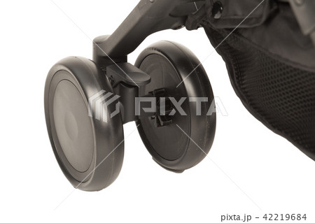 A stroller on a white background, details of a A stroller on a white background, details of a 42219684