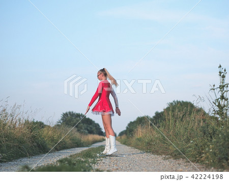 Teen Majorette Girl Twirling Baton Outdoors Teen Majorette Girl Twirling Baton Outdoors 42224198