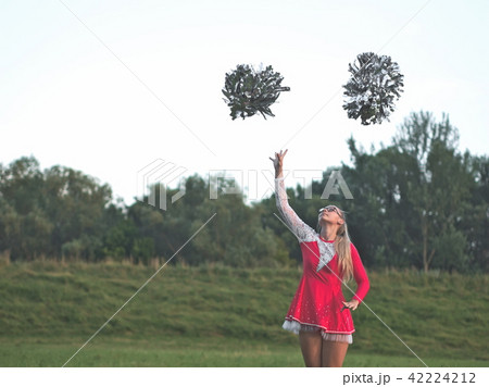 Teen Majorette Girl with Pom-poms Teen Majorette Girl with Pom-poms 42224212