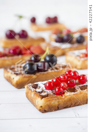 Homemade waffles with summer berries  42227541