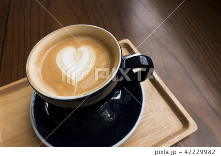 Latte on a wooden table 42229982