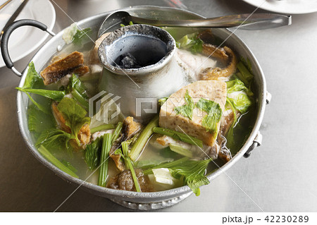 Fish soup with taro in a hot pot Fish soup with taro in a hot pot 42230289