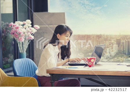 asian freelancer working on computer laptop asian freelancer working on computer laptop 42232517