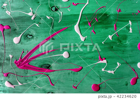 Artist working wooden table top with paint  marks 42234620