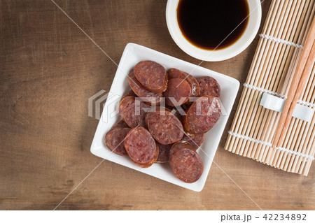top view of fried chinese sausage in ceramic plate 42234892