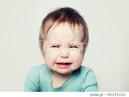 Crying baby face (6 months old) 42235222