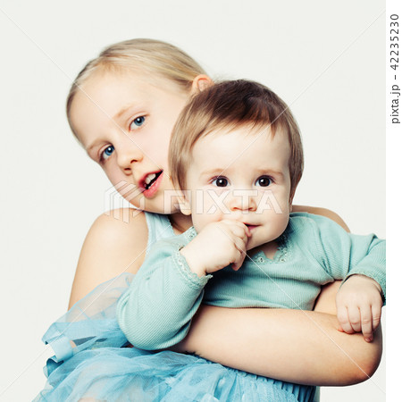 Children with pets. Beautiful girls with kittens Children with pets. Beautiful girls with kittens 42235230