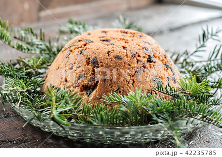 Christmas plum pudding on fir branches 42235785