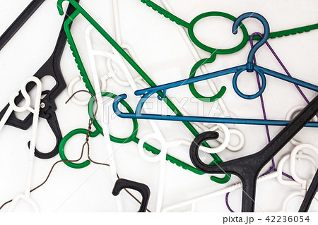 Many hangers of different shapes and colors 42236054