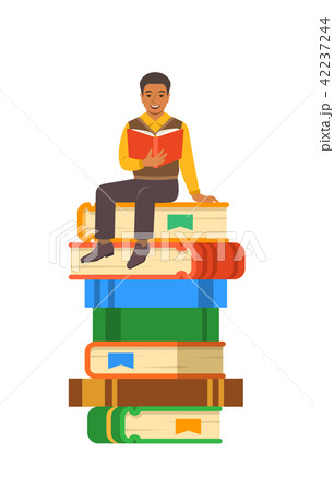 Young black boy student sits on stack of books Young black boy student sits on stack of books 42237244
