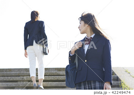 女子高生 憧れの女性の写真素材