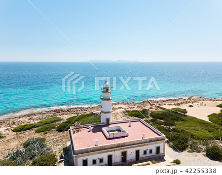 Aerial: Cape Ses Salines lighthouse in Mallorca 42255338