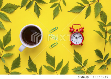 Business concept. Coffee Cup and clock alarm Business concept. Coffee Cup and clock alarm 42262935