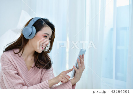 Winter Concept. Cute Asian girl in winter dress. Beautiful women 42264501
