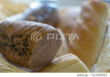 Bread mixed in a basket at a bakery. 42268063