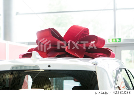 New car with red bow as present concept. 42281083