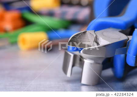 Electrician tools on table close-up Electrician tools on table close-up 42284324