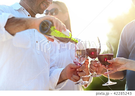 People at wine outdoor party People at wine outdoor party 42285243