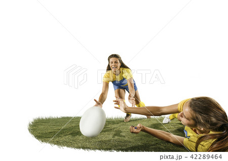 The young female rugby players isolated on white backround 42289464