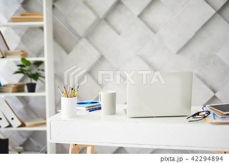 White desktop in business center White desktop in business center 42294894