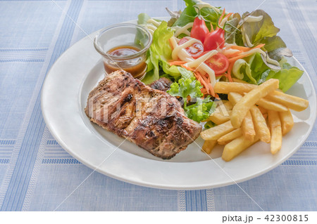 Grilled steak on dish Grilled steak on dish 42300815