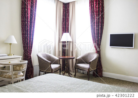 The interior of room in calm colours, sitting area The interior of room in calm colours, sitting area 42301222