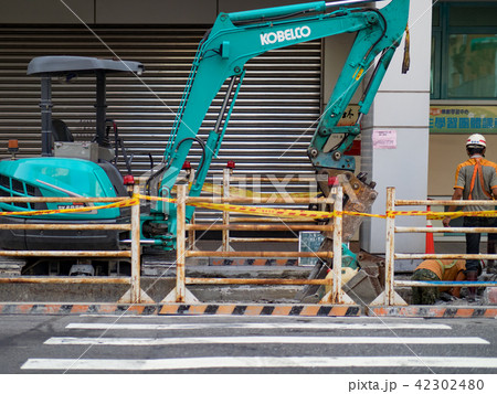 excavator on ground at day excavator on ground at day 42302480