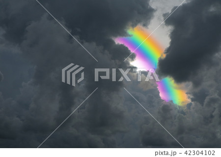 rainbow back storm dark cloud on the sky 42304102