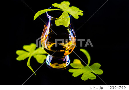 Single malt whisky in a glass of tasting Single malt whisky in a glass of tasting 42304749
