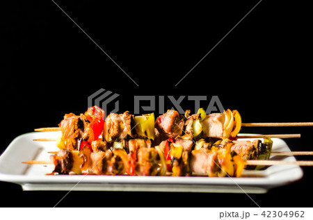 grilled skewers of meat and vegetables grilled skewers of meat and vegetables 42304962