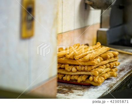 Youtiao, deep-fried dough stick Youtiao, deep-fried dough stick 42305871