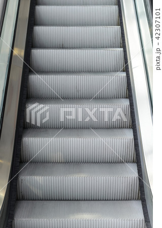 Close up escalator step outside shopping mall Close up escalator step outside shopping mall 42307101