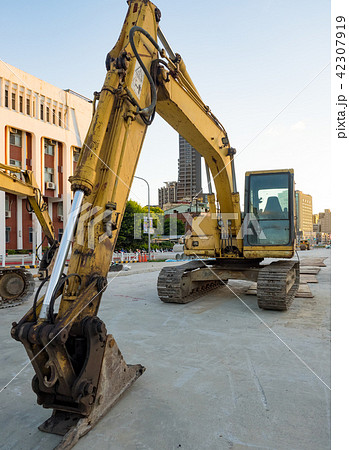 excavator on ground at day 42307919