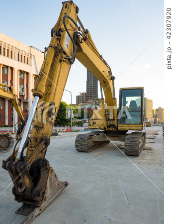 excavator on ground at day excavator on ground at day 42307920