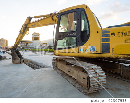 excavator on ground at day 42307933