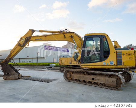 excavator on ground at day excavator on ground at day 42307935
