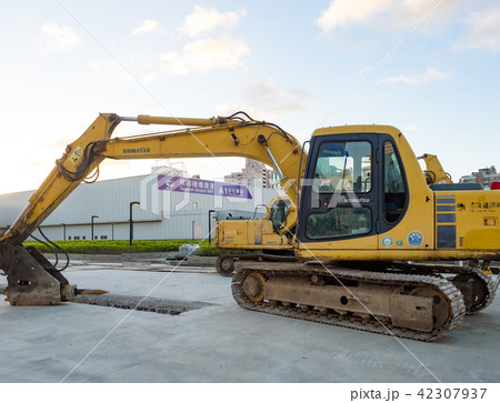 excavator on ground at day excavator on ground at day 42307937